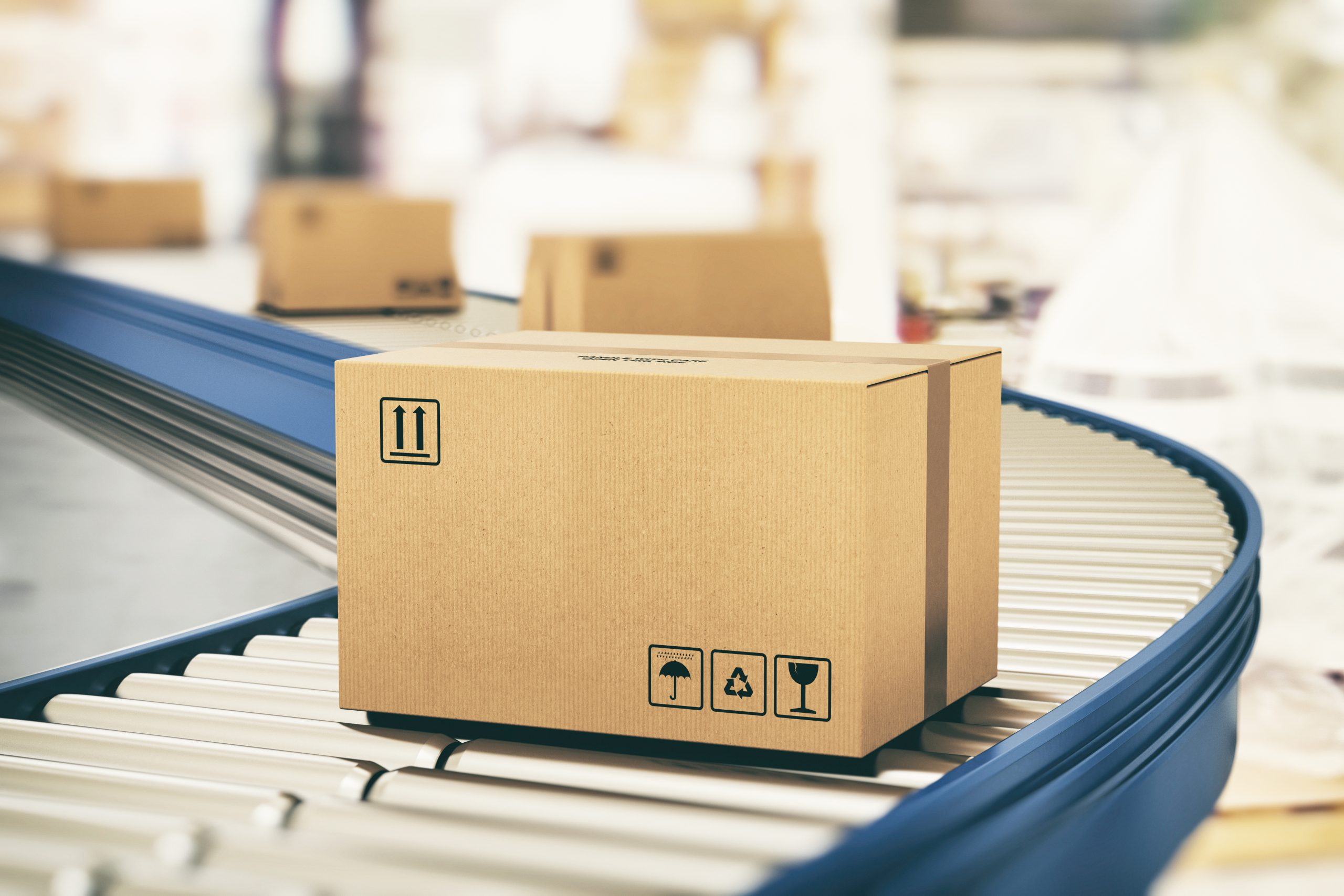 Boxes moving along on conveyor belt to demonstrate Vortex SAP consumer goods experience.